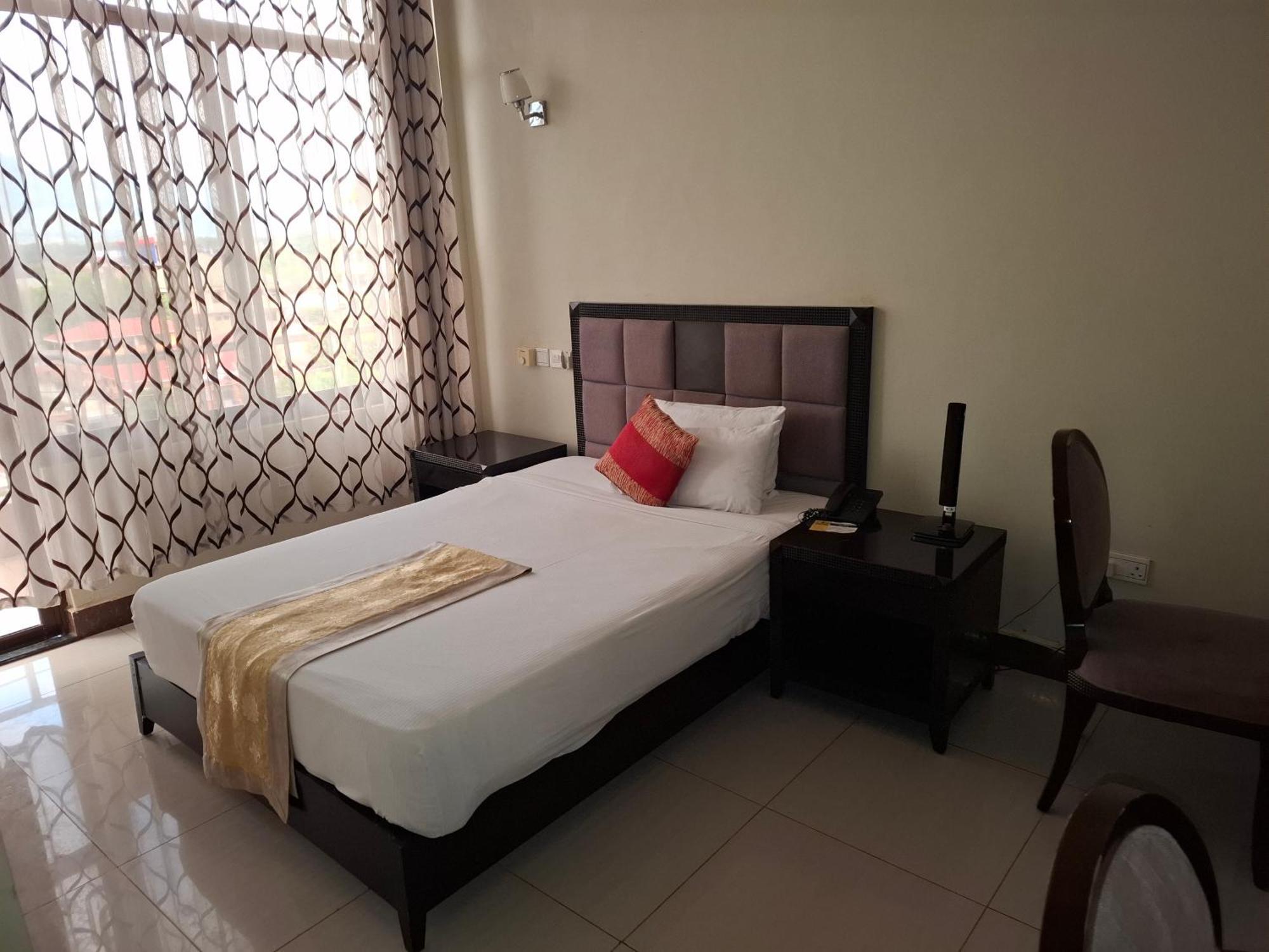 Flomi Hotel Morogoro Экстерьер фото